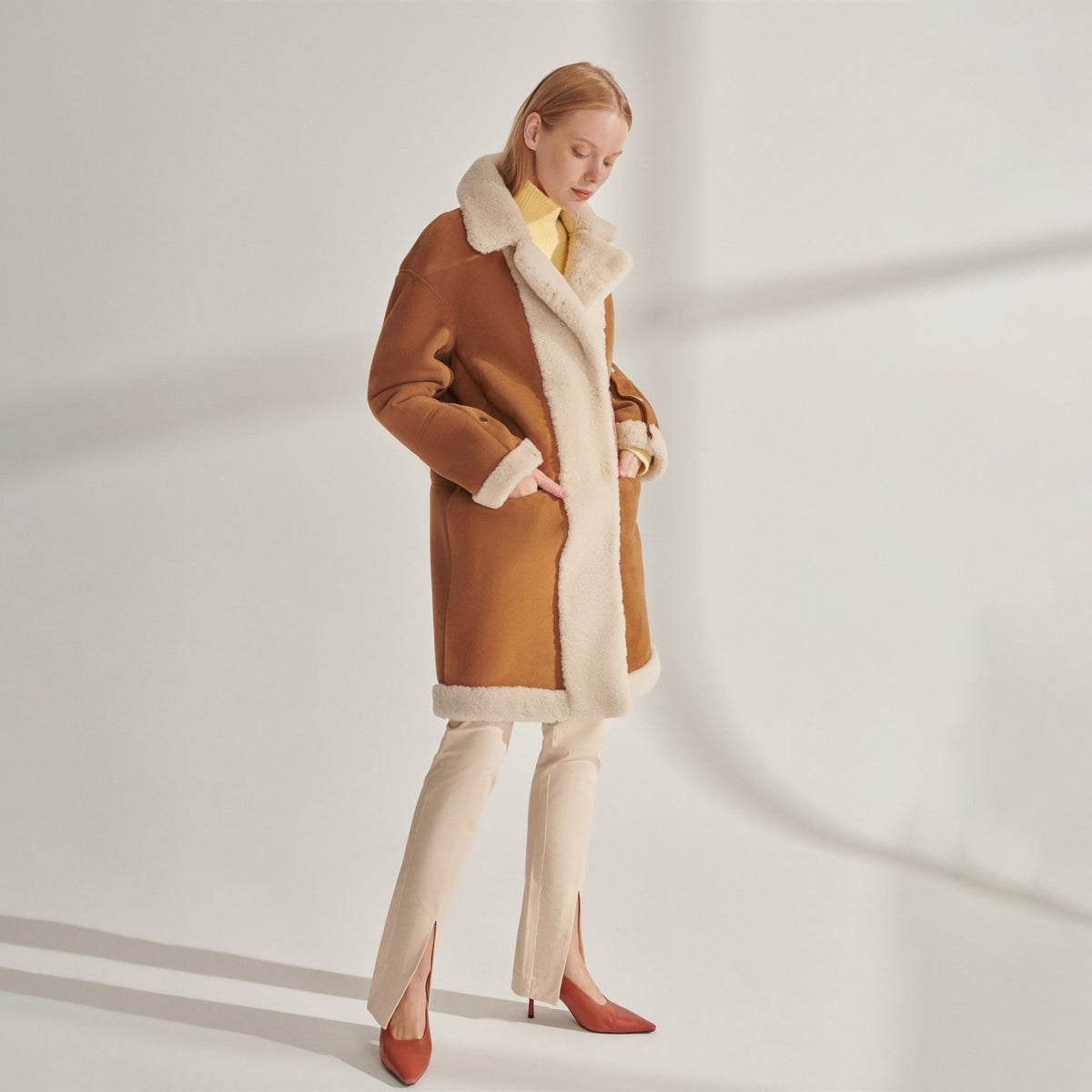 Women's Shearling-Lined Mid-Length Suede Coat with Snap Sleeves