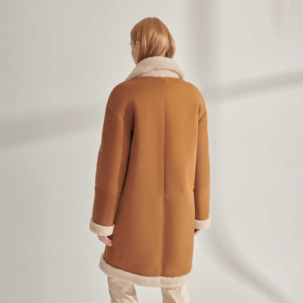 Women's Shearling-Lined Mid-Length Suede Coat with Snap Sleeves